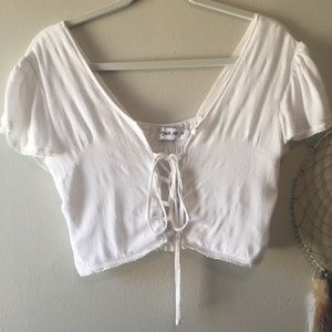 White, revealing, festival-ready crop top!